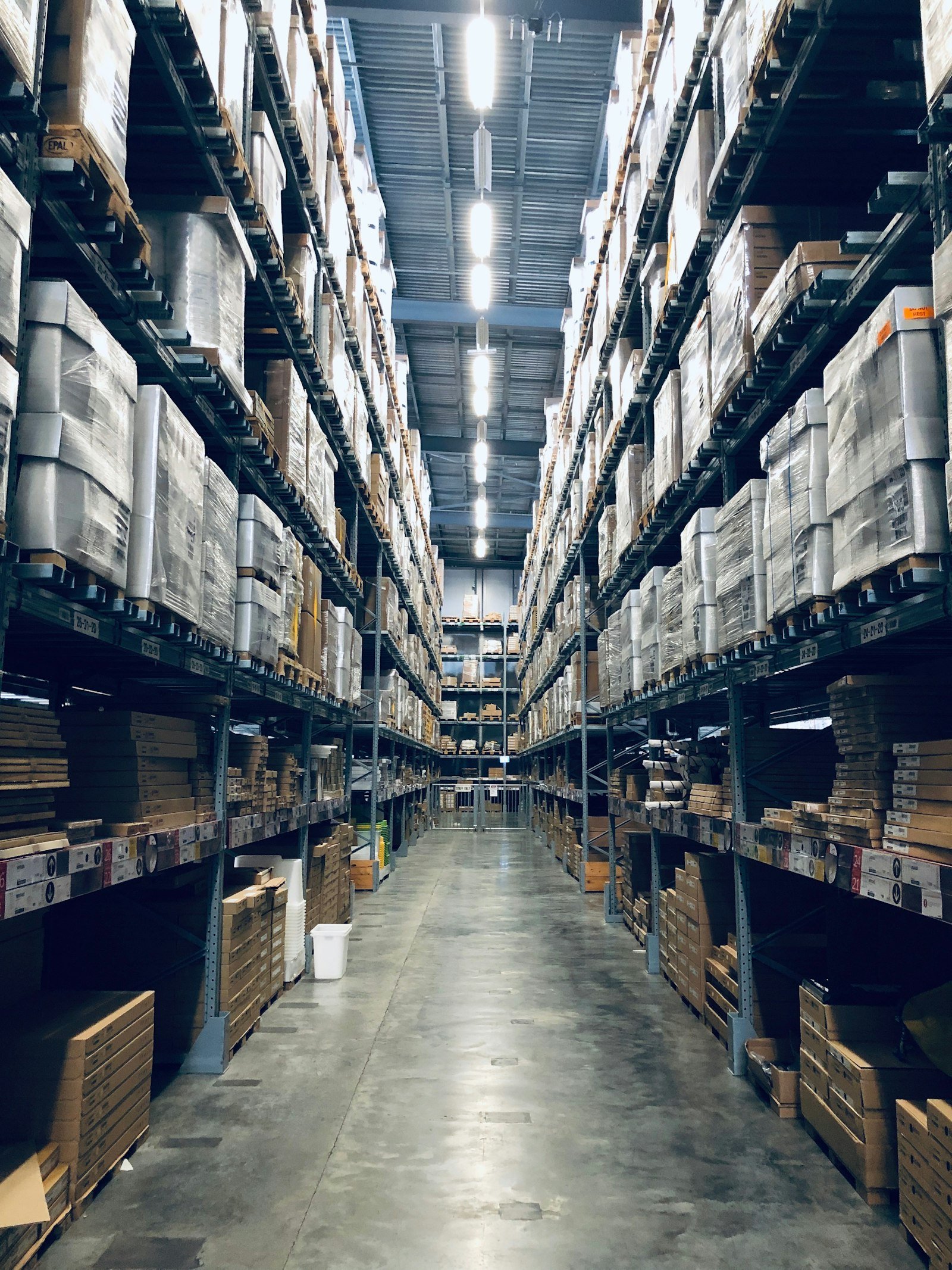 Warehouse aisle with palletized retail inventory